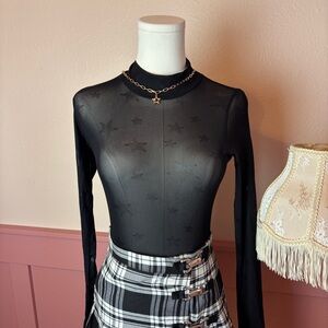 grunge vamp witchy long sleeve star bodysuit

ontwelfth
black
sz small